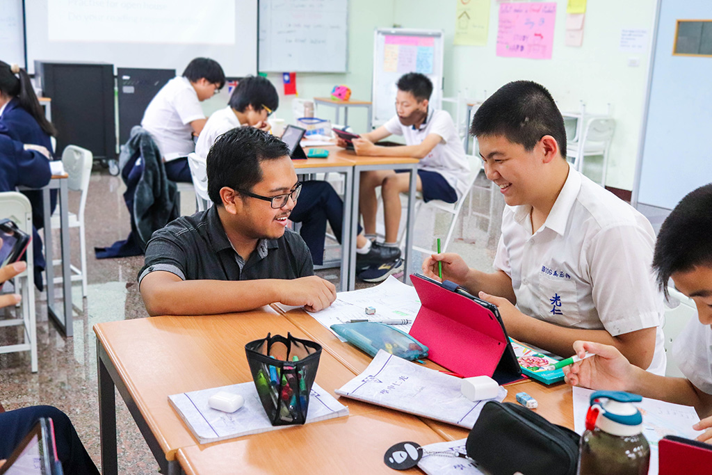 Daniel teaching in his classroom